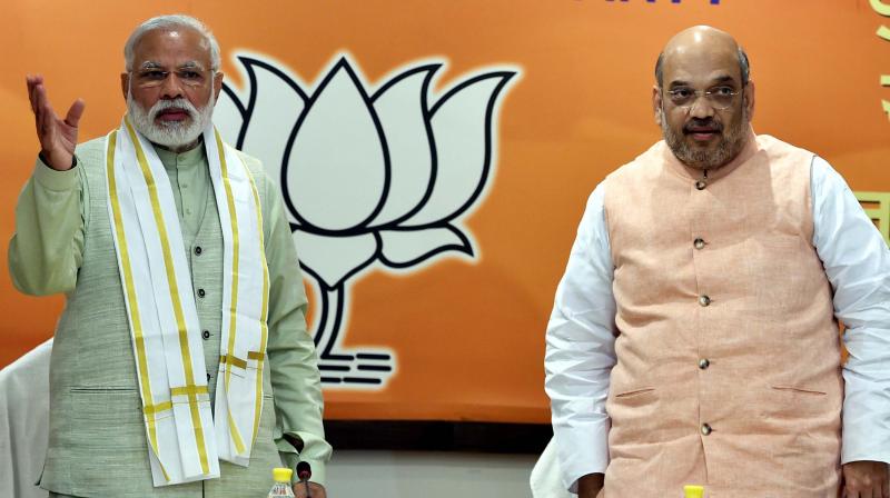 Prime Minister Narendra Modi with BJP President Amit Shah at the partys parliamentary board meeting in New Delhi. (Photo: PTI)
