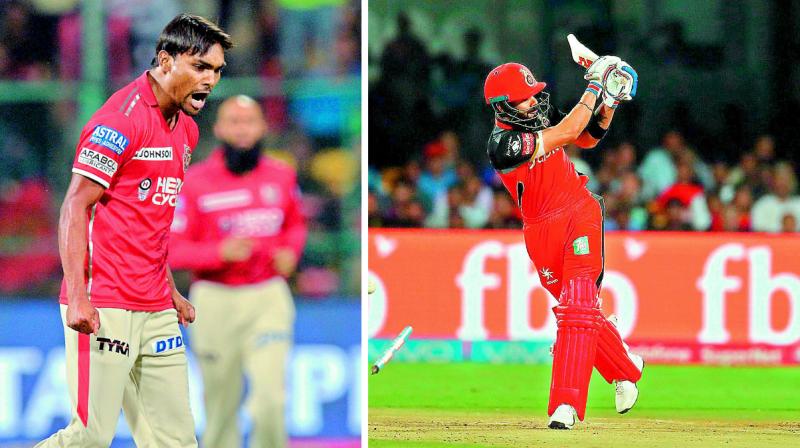 Kings XI Punjab bowler Sandeep Sharma (left) celebrates bowling out Royal Challengers Bangalore captain Virat Kohli (right).	(Photo: AFP, BCCI)