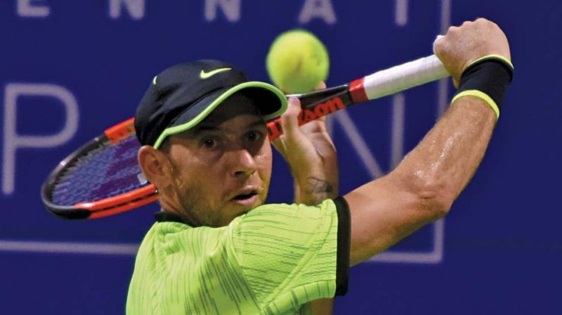 Israels Dudi Sela returns to Albert Ramos-Vinolas of Spain in their Chennai Open quarterfinal on Friday. Sela won 7-5, 6-4 (Photo: Sanjay kishore)