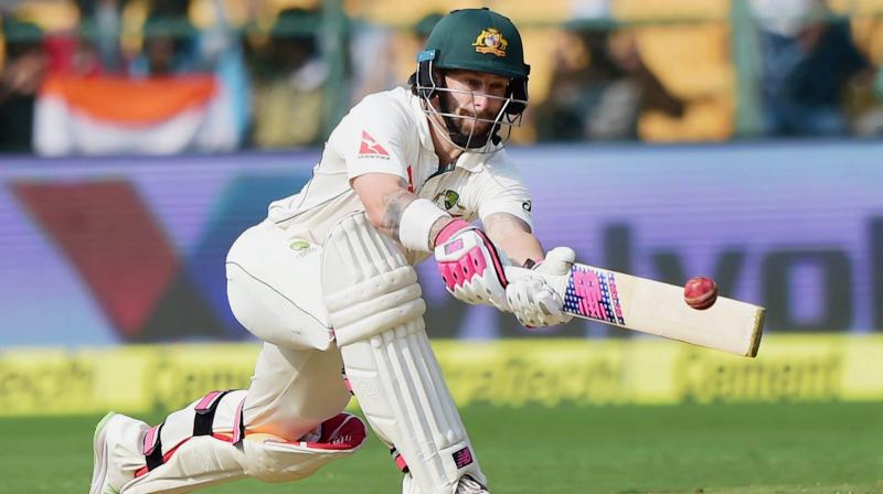 Australian cricketer Mathew Wade plays a shot during the second day of the test match between India and Australia at Chinnaswamy Stadium in Bengaluru on Sunday. (Photo: AP)