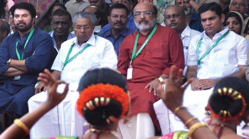 Actor Mammootty, Chief Minister Pinarayi Vijayan, Finance Minister T.M. Thomas Isaac and Hibi Eden, MLA, watch the welcome dance at the Maharajakeeyam- Maharajas Colleges mega alumni reunion at the college campus in Kochi on Sunday. (Photo: SUNOJ NINAN MATHEW)