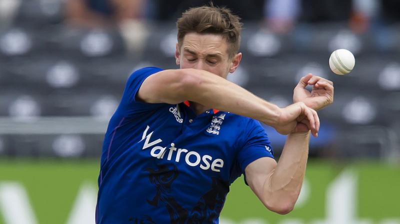 \A scan has confirmed that Chris Woakes sustained a left side strain in yesterdays ICC Champions Trophy match against Bangladesh,\ said an England and Wales Cricket Board statement. (Photo: AFP)