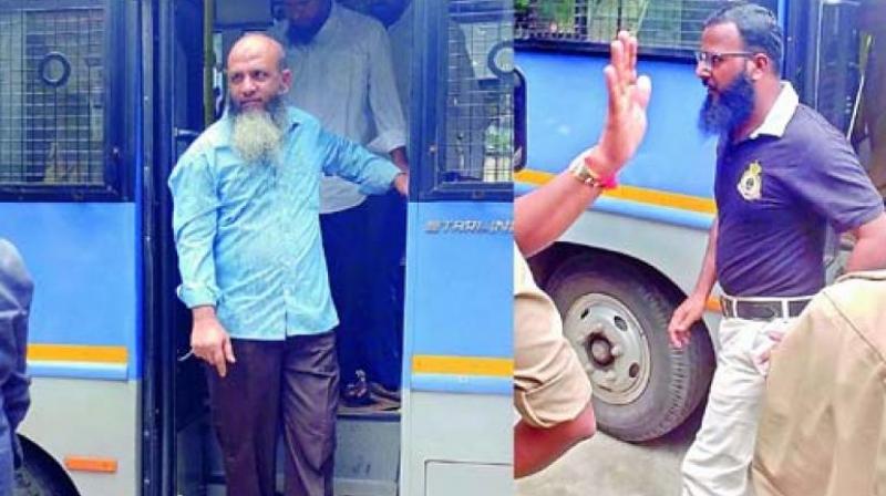 Two persons who were arrested in Old Task Force blast case being brought to the Nampally court on Thursday. (Photo: DC)