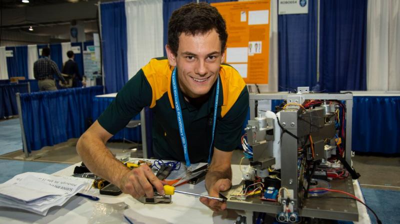 Oliver Nicholls, 19, of Sydney, Australia, was awarded first place on Friday, May 18, 2018, for designing and building a prototype of an autonomous robotic window cleaner for commercial buildings at the 2018 Intel International Science and Engineering Fair, a program of Society for Science & the Public and the worlds largest international pre-college science competition. (Credit: Chris Ayers/Society for Science & the Public)