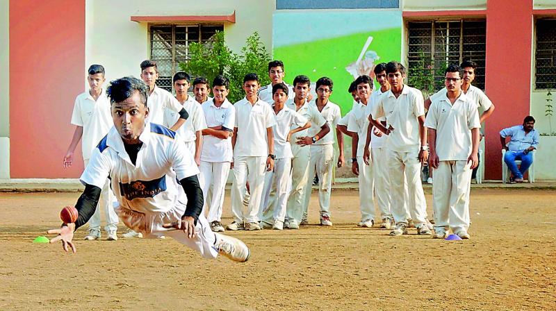 A file photo of boys taking part in a cricket summer coaching class conducted at the Victory Playground in Hyderabad. (Photo: DC)