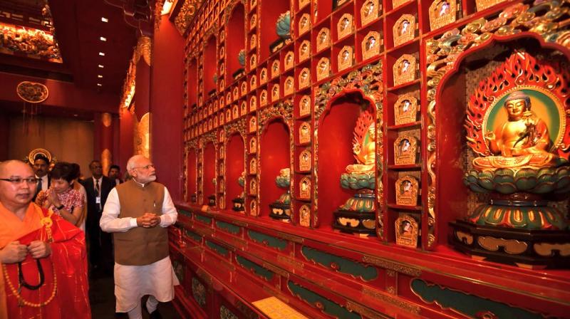 On his last day in Singapore, Prime Minister Narendra Modi visited a Hindu temple, a Buddhist temple, and a mosque. (Photo: Twitter | @narendramodi)