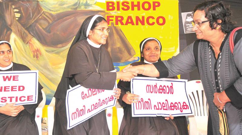 Womens rights activist Sister Jesme greets the nuns staging protest at High Court Junction in Kochi on Monday seeking the arrest of Jalandhar Bishop Franco Mulakkal accused of raping a nun. (Photo: ARUN CHANDRABOSE)