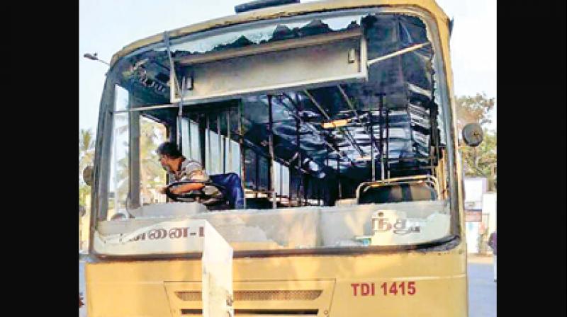 Miscreants ransack a state transport bus parked near Koyambedu on Monday.(Photo: DC)