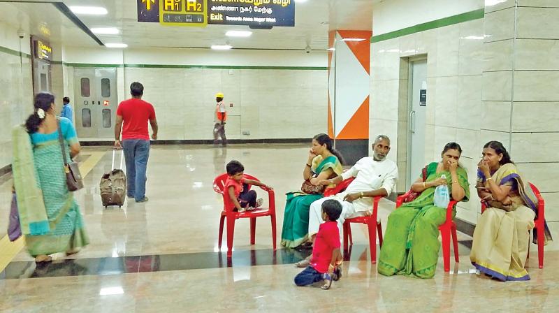 A day after the underground metro sttrech was  inaugurated, commuters wait at Thirumangalam  station on Monday. (Photo: DC)