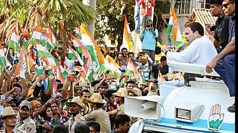 Congress president Rahul Gandhi addresses an election rally in Kumta on Thursday. Earlier in Honnavar, slogans praising PM Modi were raised at the end of Congress poll rally.  (Photo:PTI)