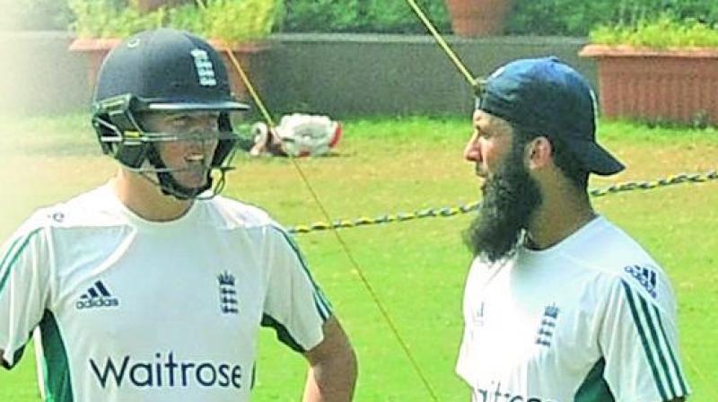 Englands Joe Root (left) and Moeen Ali are in conversation during a practice session in Mumbai on Saturday.(Photo: Rajesh Jadhav)