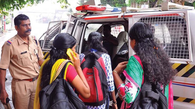 Police offers ride for students waiting to go home after their LET entrance exam held at the Government Model Higher Secondary School in Kozhikode on Saturday (Photo: Viswajith K)