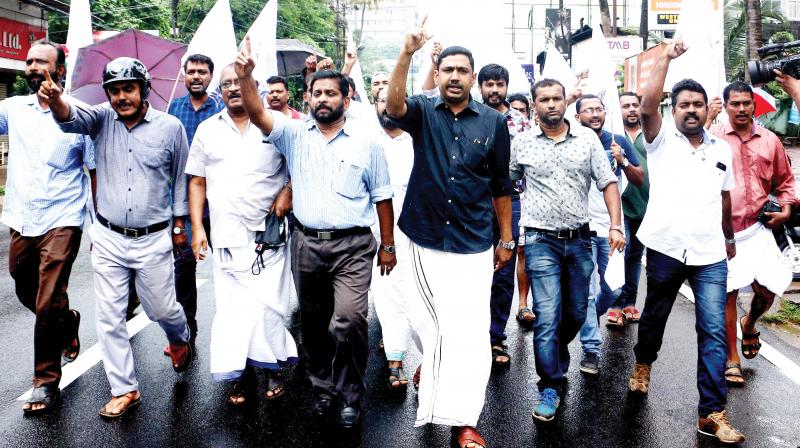 Traders take out a march against the two days of hartal in Kozhikode. (Photo: DC)