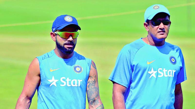 Virat Kohli and Anil Kumble during Indias training session ahead of the one-off Test against Bangladesh in Hyderabad (Photo: S. Surender Reddy)