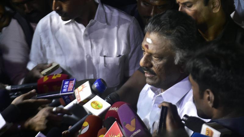 Tamil Nadu Chief Minister O Panneerselvam addressing to media after end of a meditation in front of late J Jayalalithaas burial site at the Marina Beach in Chennai on Tuesday. On Sunday, he tendered his resignation from the post paving the way for AIADMK General Secretary V K Sasikala to become Chief Minister. (Photo: AP)