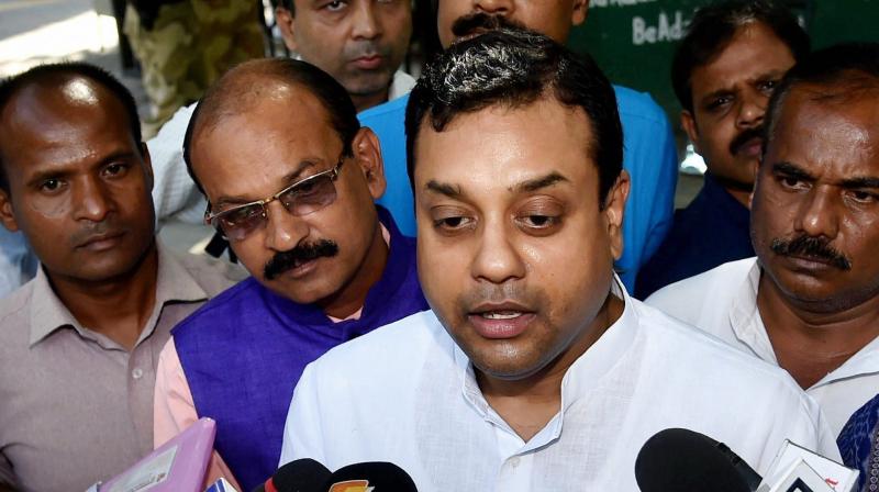 BJP spokesperson Sambit Patra said Congress Vice-President Rahul Gandhi is politicising the flood situation in Gujarat. (Photo: PTI)