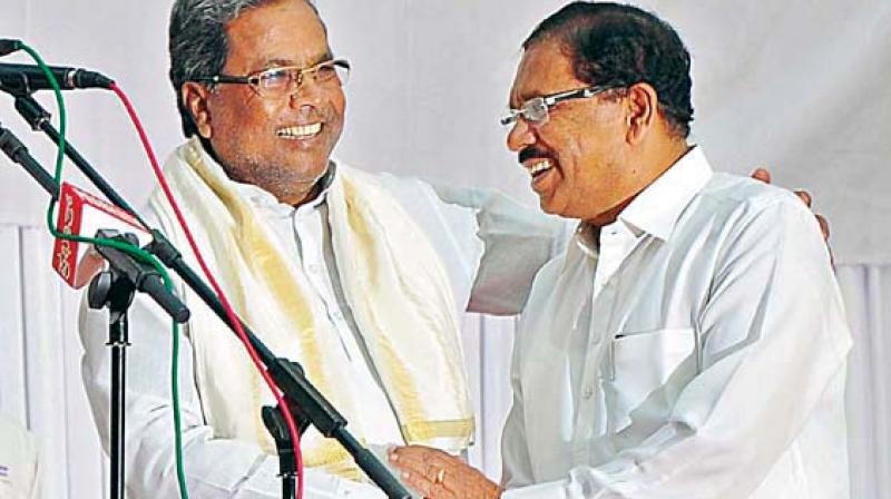 Chief Minister Siddaramaiah and KPCC president Dr G. Parameshwar in  a file photo