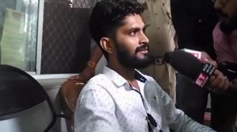 On June 1, Rawats son (in pic) had pulled a car driver out of his vehicle in Bansaras Vidhyut Colony area, the video appeared to show. (Photo: Twitter | ANI)