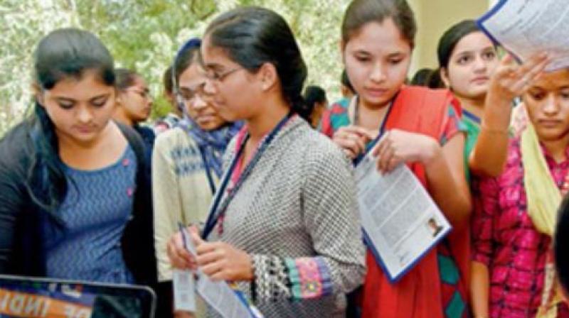 Students enrol their names for the Behtar Bharat programme launched by the NSUI at Osmania University in Hyderabad on Monday. S. Surender Reddy.