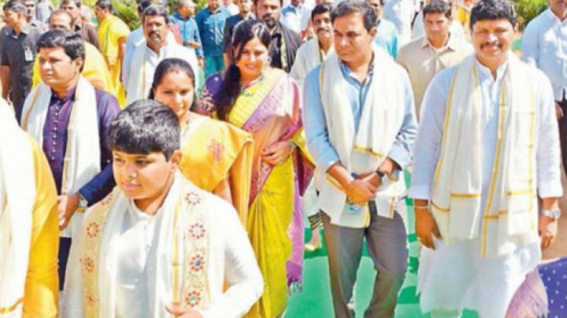 Chief Minister K. Chandrasekhar Raos daughter and TRS MP Kalvakuntla Kavitha along with her husband D. Anil Kumar and younger son Aarya (left), the CMs son and TRS working president K.T. Rama Rao along with his wife Shailima Rao and (extreme right) TRS Rajya Sabha MP J. Santhosh arrive at the farmhouse in Erravalli, Gajwel for the Sahasra Chandi Yagam on Monday.