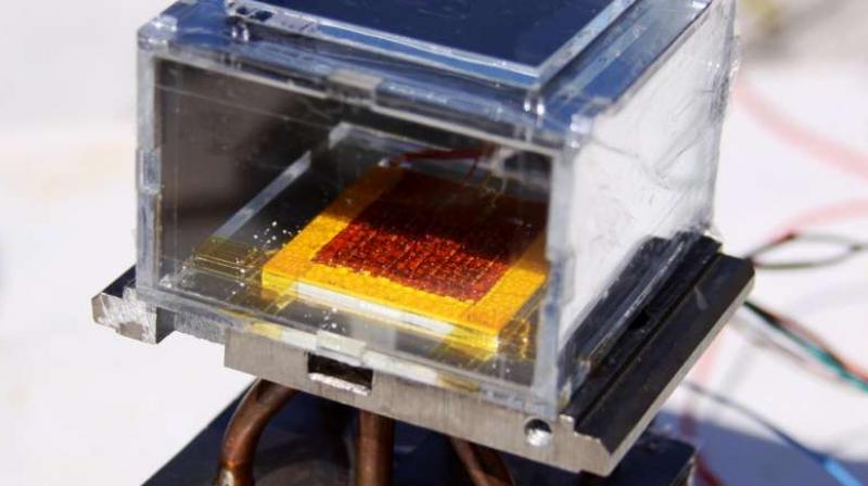 The new system consisted of dust-sized MOF crystals compressed between a solar absorber and a condenser plate, placed inside a chamber open to the air.