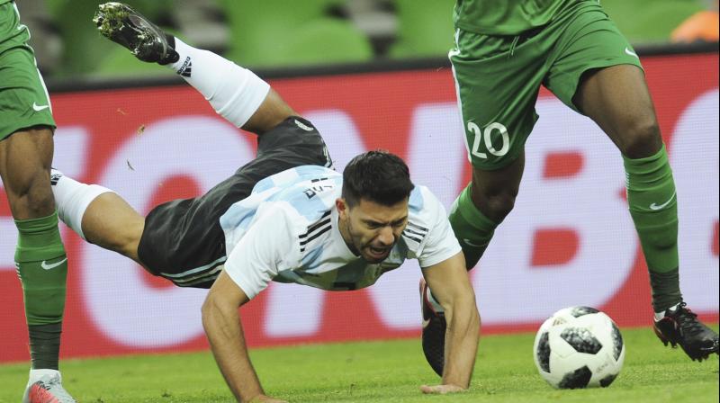 Manchester Citys Sergio Aguero faints at half-time as Argentina lose to Nigeria 4-2