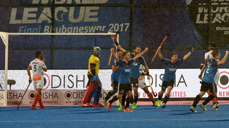 Argentina players celebrate after scoring the opening goal against India in the Hockey World lEAGUE SEMI-FINAL. (pHOTO: pti)