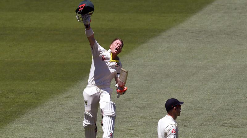 David Warner reached his hundred off 130 balls with a flick off his hip and celebrated by leaping into the air and ripping off his helmet to salute the 88,172 Boxing Day crowd at the MCG.(Photo:AFP)