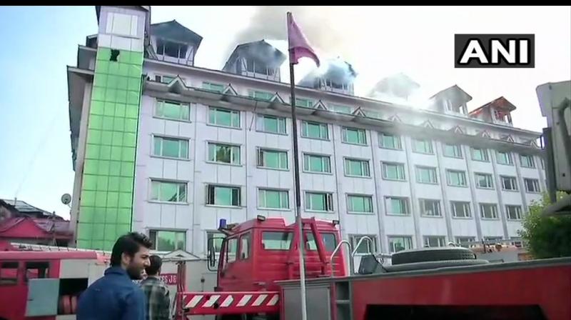 The fire broke out at Hotel Pamposh near Regal Chowk in the heart of the city here, a police official said. (Photo: ANI/Twitter)