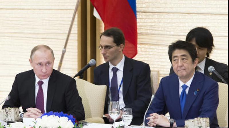 Russian President Vladimir Putin and Japanese Prime Minister Shinzo Abe held talks in Abes ancestral hometown and in Tokyo in the latest attempt to secure a deal since Japan and the former Soviet Union began discussions in 1956. (Photo: AP)