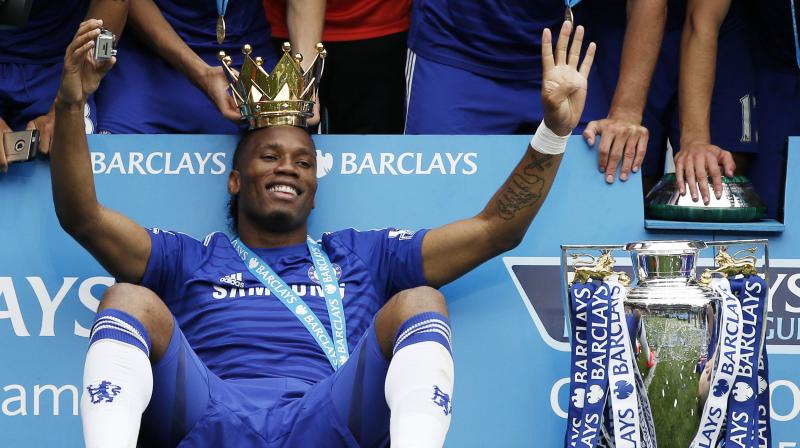 Drogba went on to win three Premier League titles in his first eight years at Chelsea as well as four FA Cups and two League Cups. (Photo: AFP)