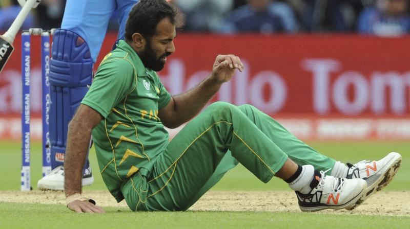 The 31-year-old Wahab Riaz sustained the injury whilst bowling during his sides crushing 124-run defeat against arch-rivals India at the Edgbaston Cricket Ground in Birmingham on Sunday.(Photo:AP)