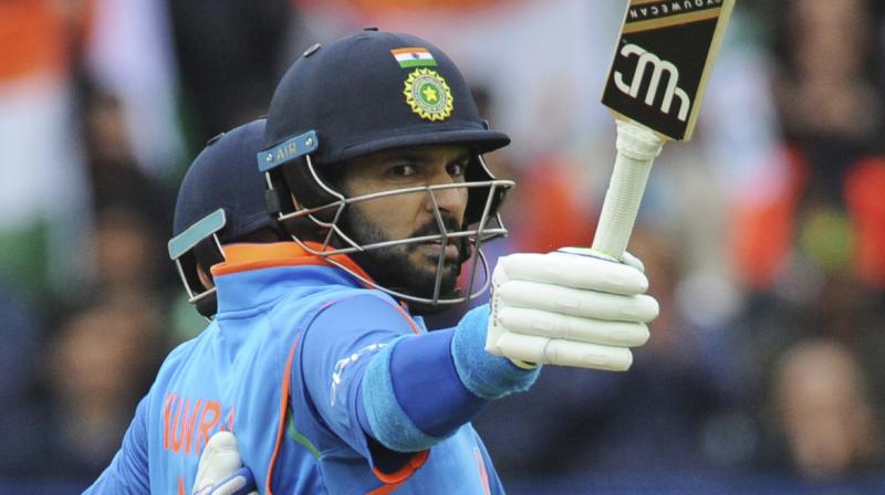 While Yuvraj Singh was hitting freely, Virat Kohli slowly gained in momentum and hammered his 40th fifty off 58 balls and his first against Pakistan. (Photo: AP)