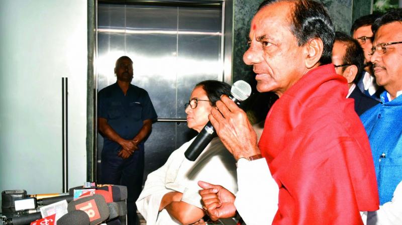 Telangana state Chief Minister K. Chandrasekhar Rao along with West Bengal Chief Minister Mamata Banerjee addresses a meeting in Howrah on Monday. (Photo: DC)