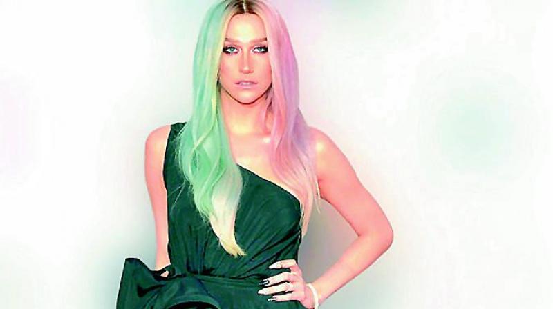 Kesha fights online harassment