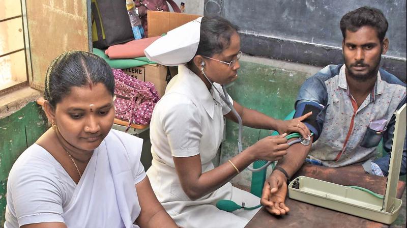 Bull tamers undergo medical examination at a primary government school at Avaniyapuram near Madurai on Saturday (Photo: DC)