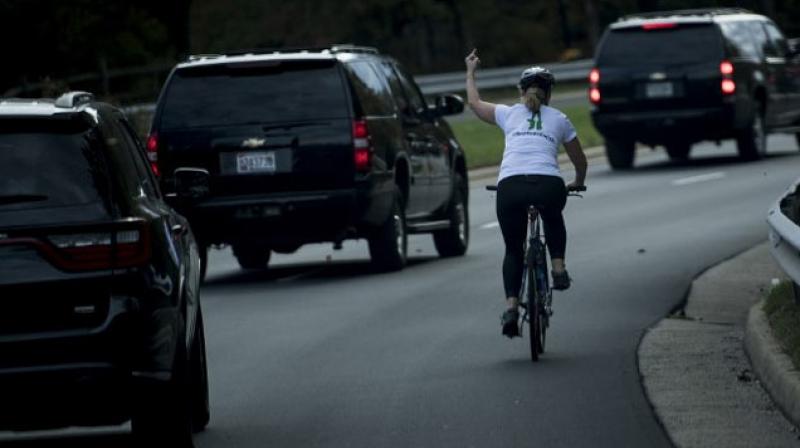 Juli Briskman, the cyclist in question, has allegedly lost her job at Akima LLC. (Photo: AFP)