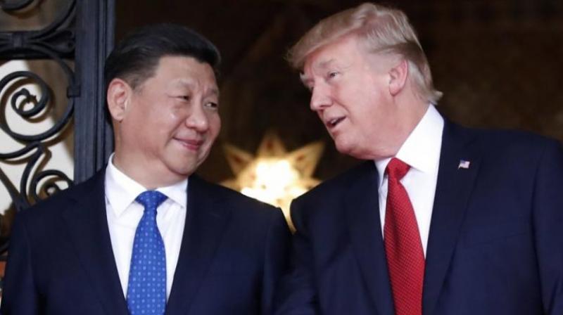 Xi Jinping will roll out the red carpet for Donald Trump on Wednesday during his five-nation Asia tour. (Photo: AP File)