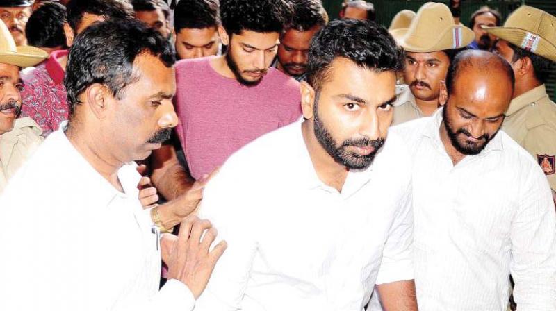 A file picture of Mohammed Nalapad Haris being taken to a court in Bengaluru.