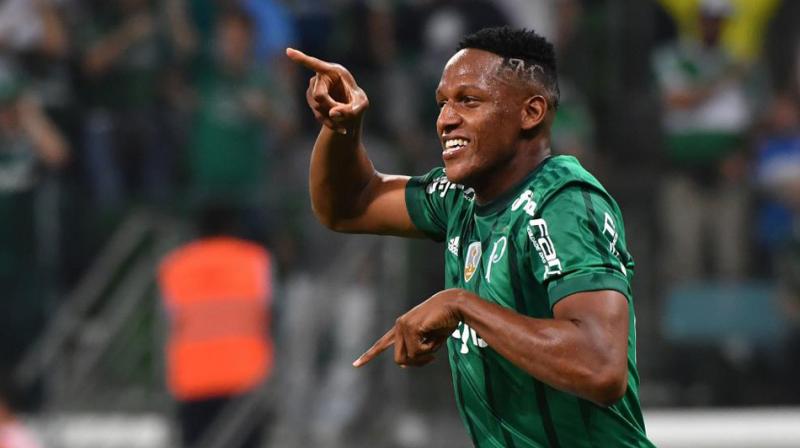: La Liga leaders Barcelona have signed centre-back Yerry Mina from Palmeiras on a five-and-a-half year contract for a fee of 11.8 million euros ($14 million), the Spanish club said on Thursday.(Photo: AFP)
