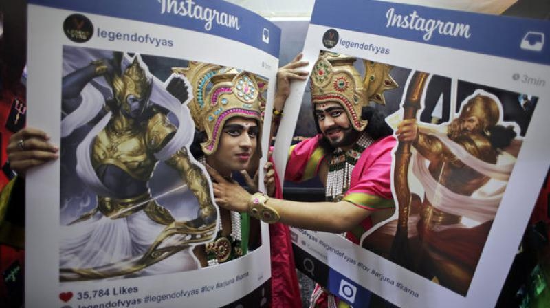 Fans dressed as Hindu mythological characters pose for photographs at Delhi Comic Con in New Delhi, India, Saturday, Dec. 5, 2015. (Photo: AP)