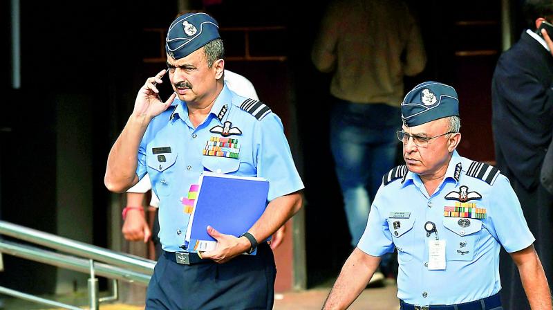 Deputy chief of air staff Air Marshal V.R. Chaudhari with Air Marshal Anil Khosla (R) leave the Supreme Court after a hearing on Rafale Deal on Wednesday. (PTI)