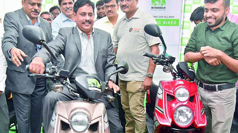 Metro e-bikes are going to be given to citizens from August 15 in Metro stations of Hyderabad and the bikes were introduced by managing director N.V.S. Reddy at Ameerpet station on Monday.  (Photo:S. Surender Reddy)