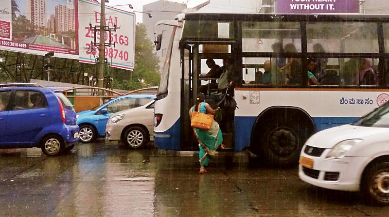 BMTC buses stop in the middle of the road to pick up or drop passengers. BMTC drivers are a law unto themselves.