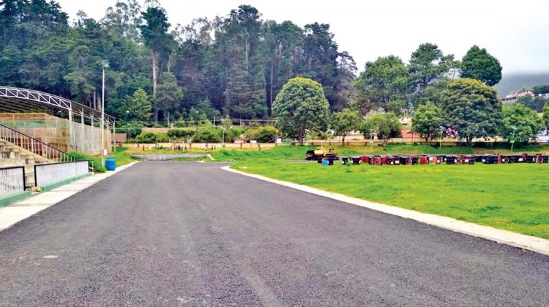 Works related to laying synthetic track is going on at snails pace at HADP open  air stadium in Ooty. (Photo:DC)