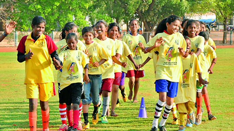 Girls all set to participate in a football camp