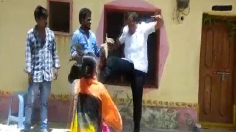TRS MPP Immadi Gopi kicking the woman     (Image: ANI)