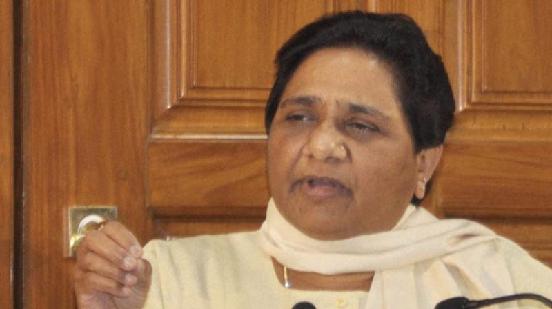 BSP supremo Mayawati addressing press conference at her residence in Lucknow. (Photo: PTI)