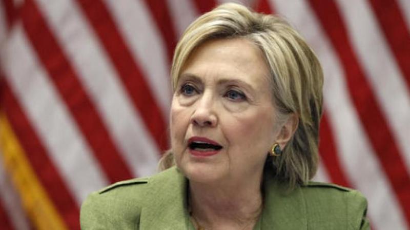 About a week later, Clinton addressed the issue, saying that about half the 60,000 emails were work-related and she had turned them over to the State Department. (Photo: AP)