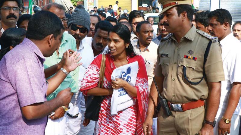Mullapally RamachandranA woman requesting to enter to Civil Station amid the UDF dharna against the lethargy of state machinery in the post-flood period, in front of the  Civil Station, Kozhikode on Wednesday. (DC)